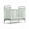 Green metal crib with slatted sides and mattress support dimensions 120 x 60 x 90cm